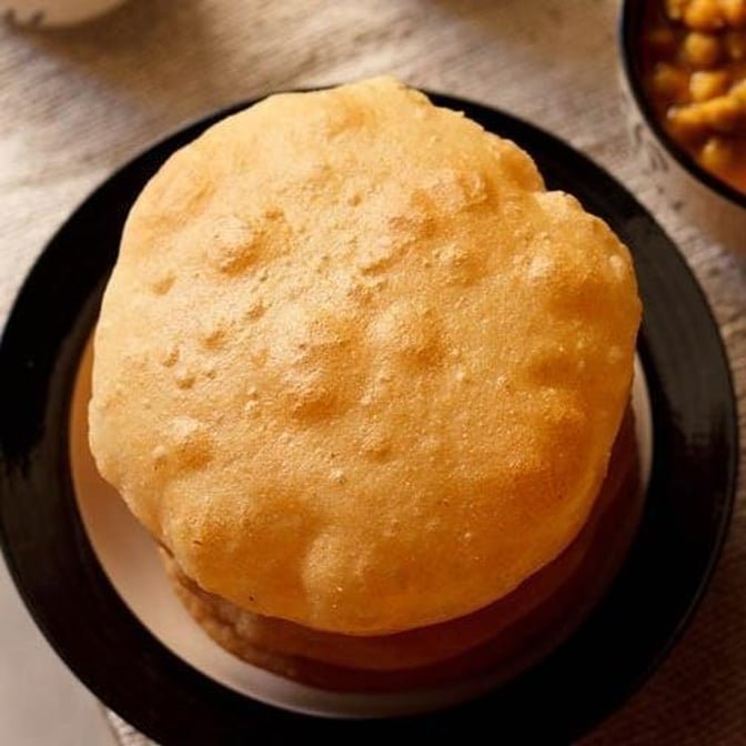 Extra Bhatura at Basant Restaurant Cakes & Sweets